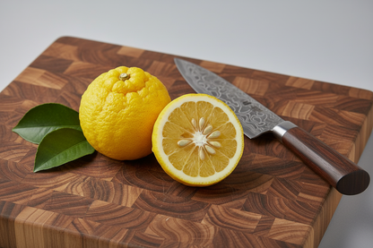 add a leaf or two,sitting on a butcher block cutting board and a sharp high quality japanese knife in view, or laying netx 